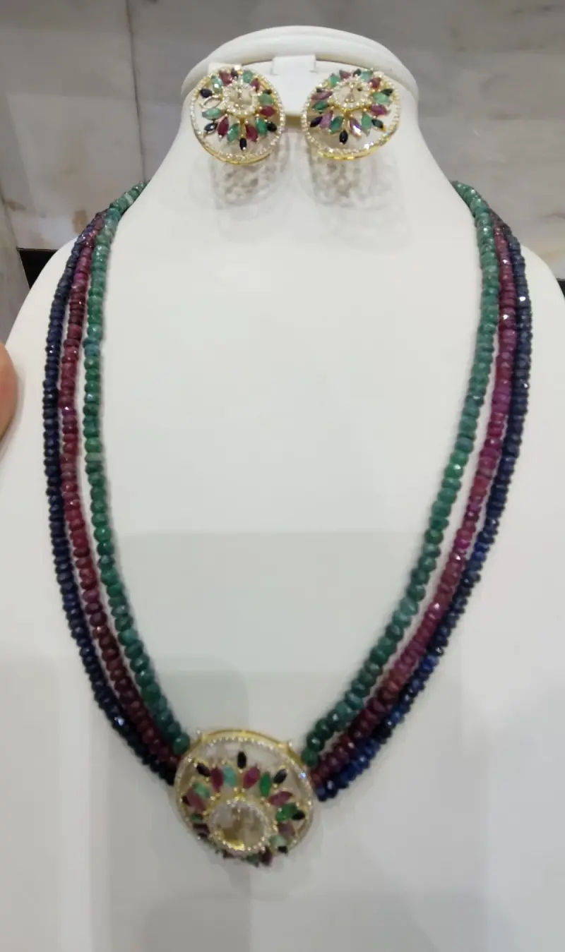 حلق وتعليقه الماس عع عقود احجار كريمه