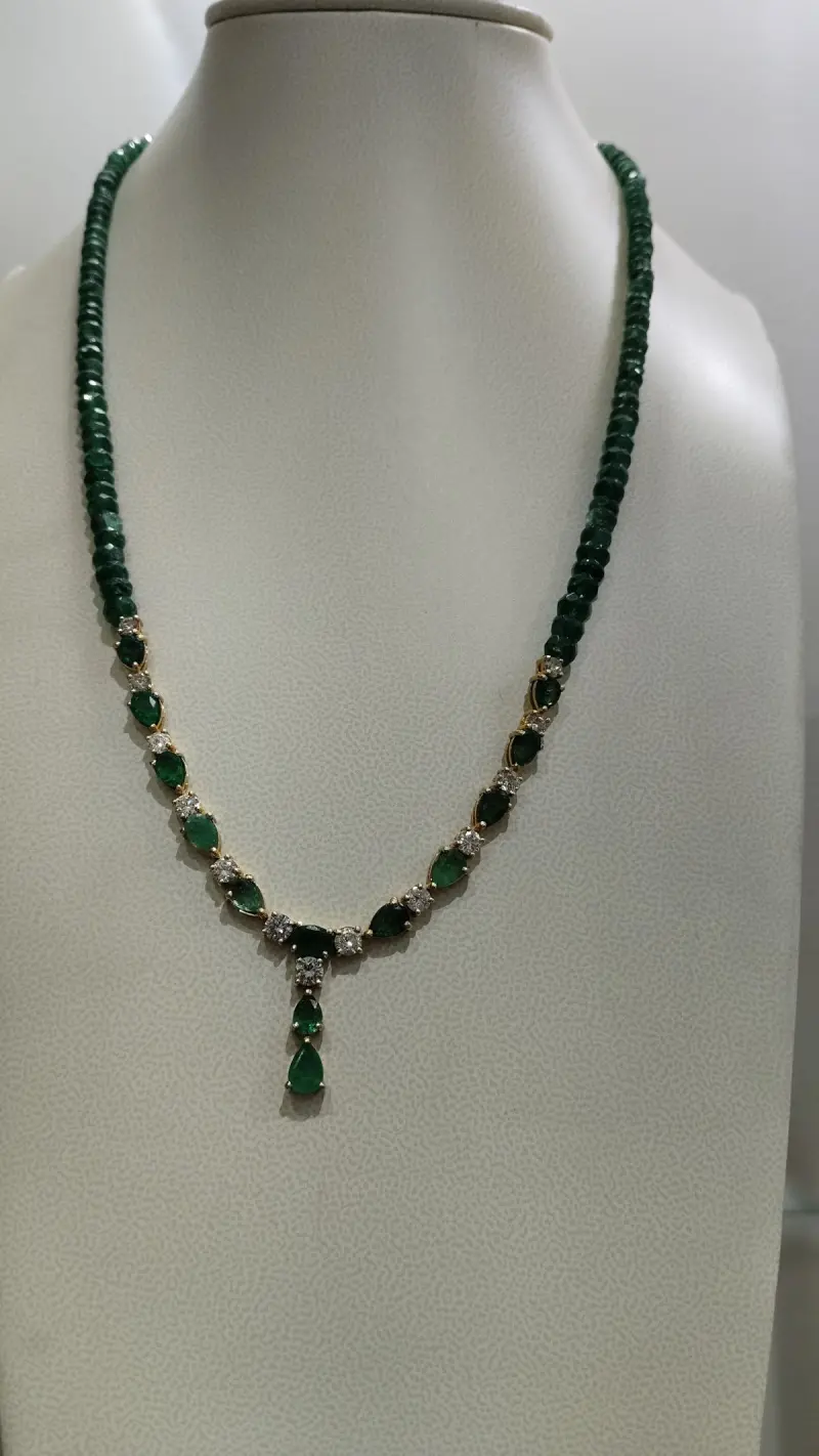 عقد الماس سلتير مع احجار الزمرد